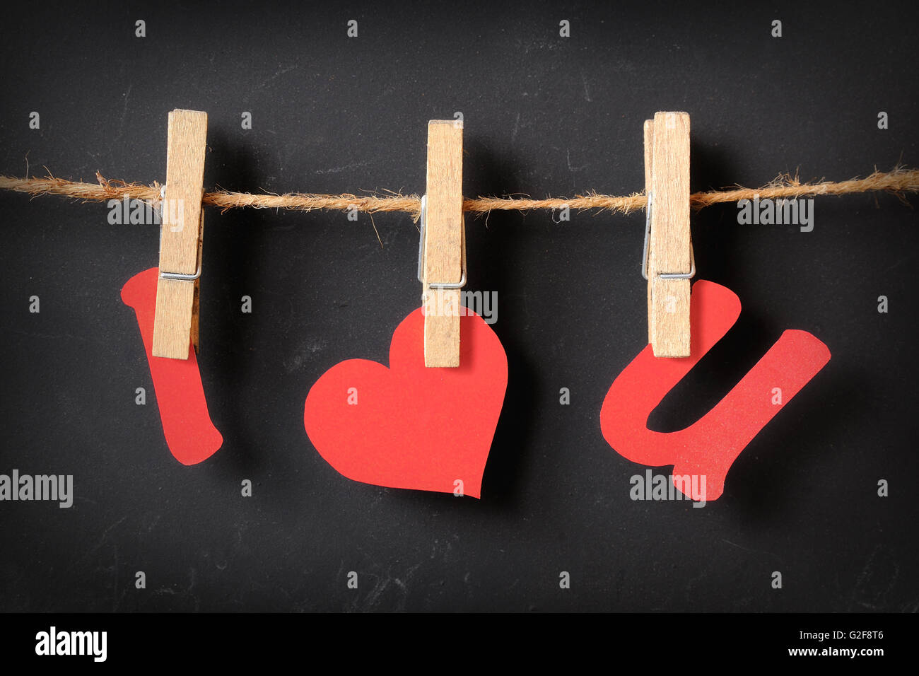 I love u appeso con sfondo blackboard Foto Stock