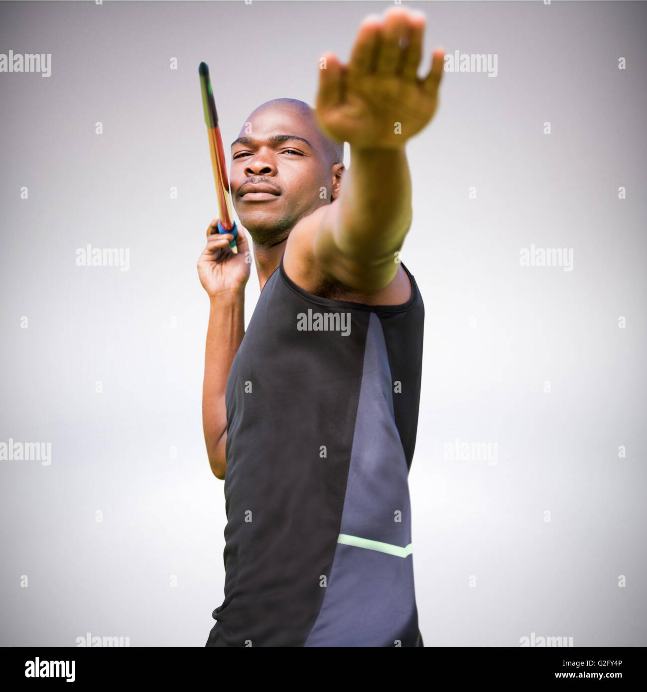 Immagine composita del ritratto di uno sportivo praticando un giavellotto Foto Stock