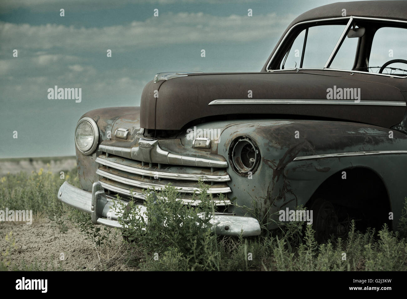 Vecchio Abandonded auto in campo, dettaglio, Parco nazionale Badlands, Dakota del Sud, STATI UNITI D'AMERICA Foto Stock