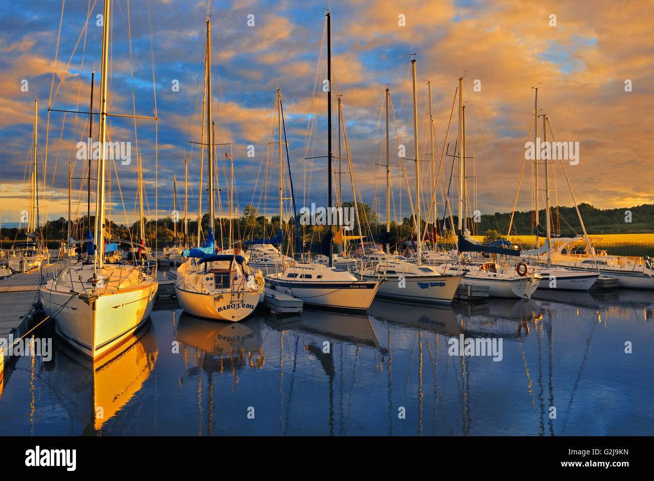 Barche in marina al tramonto San Henri de Taillon Québec Canada Foto Stock