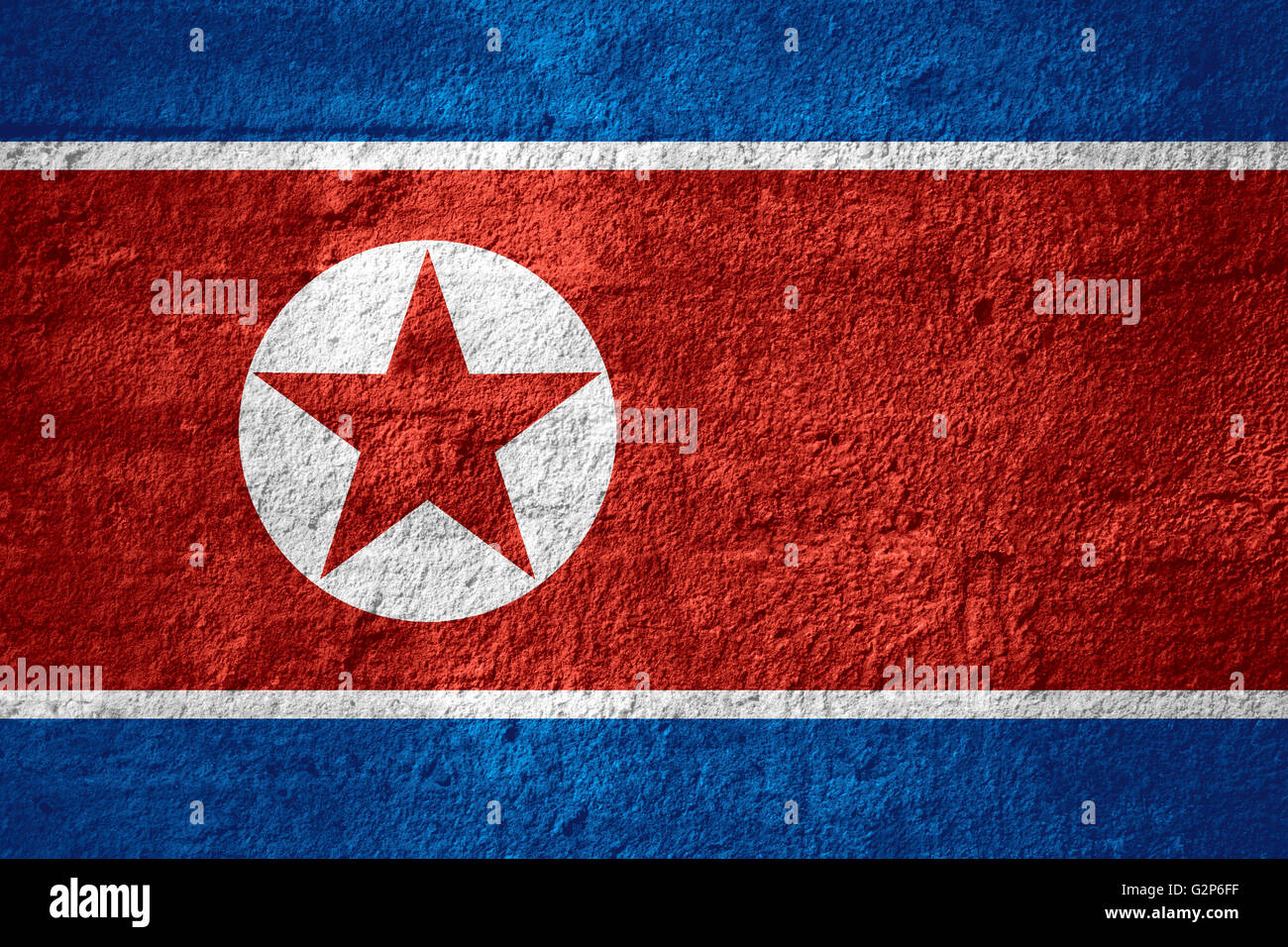 Bandiera della Corea del Nord o Corea del Nord banner sulla trama ruvida Foto Stock