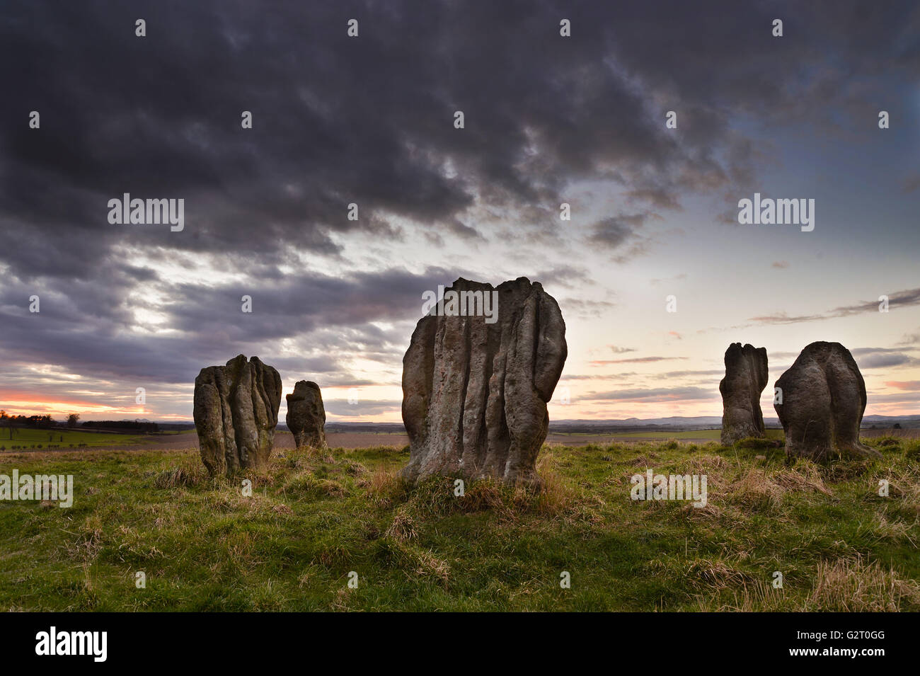 Standing stone circle vicino a Duddo nel nord di Northumberland. Questo sito neolitihic è raramente visitato. Foto Stock