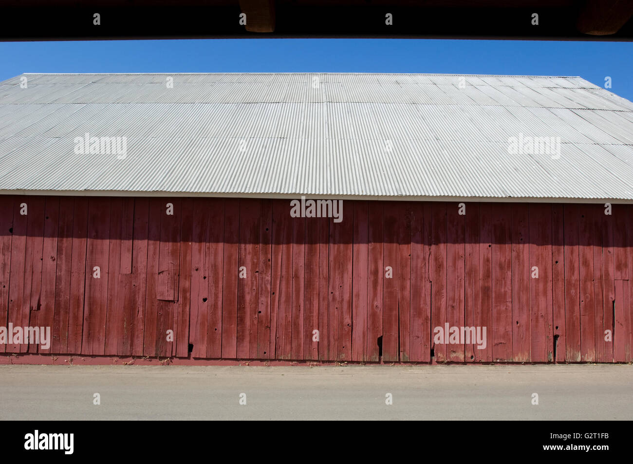 Il lato di un fienile in una fattoria Foto Stock