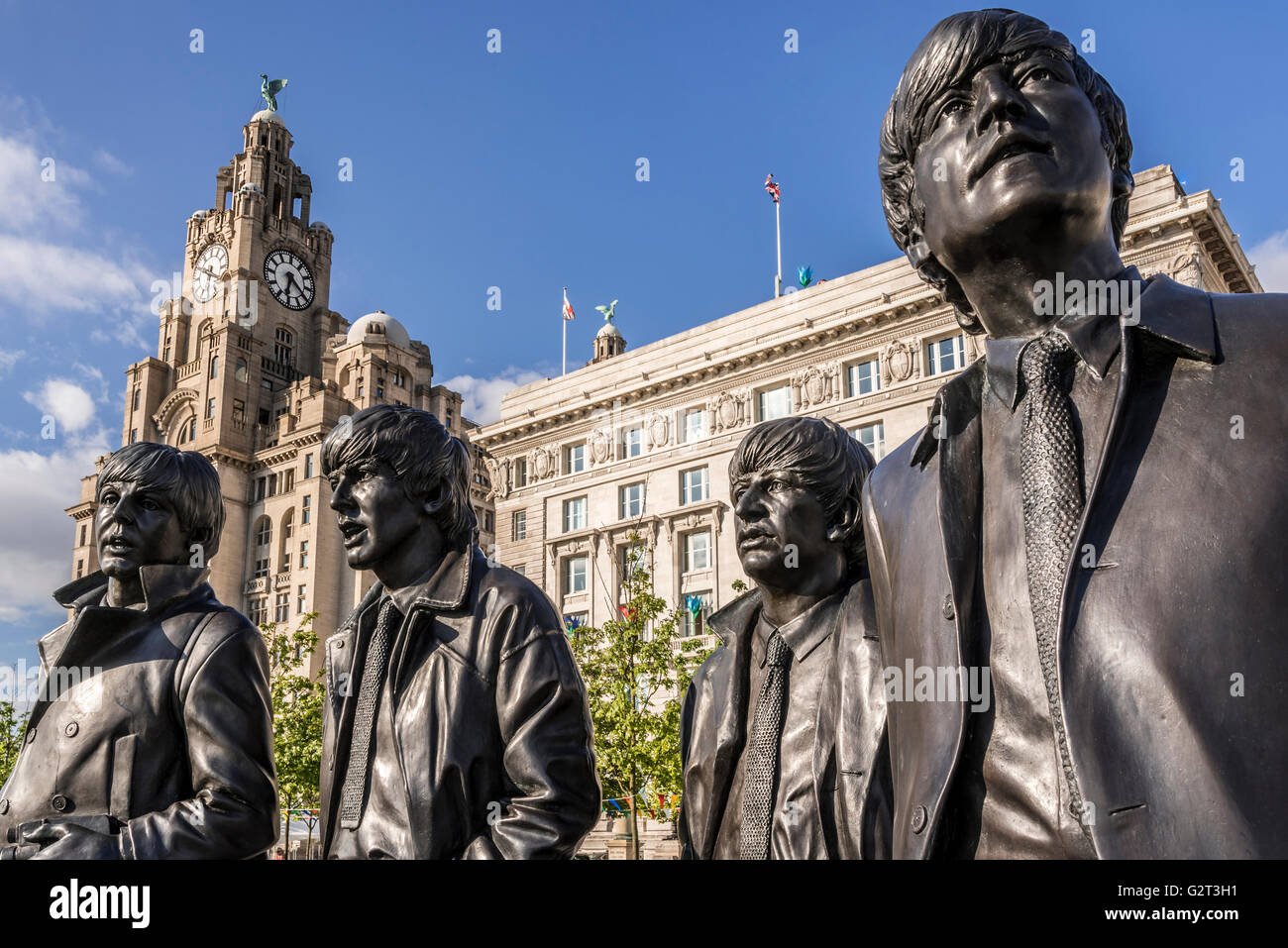 La statua del Beatles a Liverpool pierhead waterfront. Foto Stock