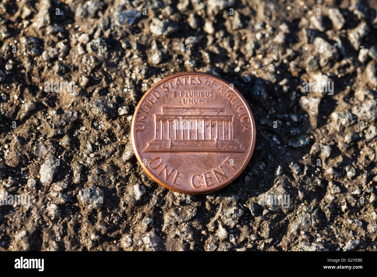 Fortuna penny su asfalto (un dollaro cento) Foto Stock