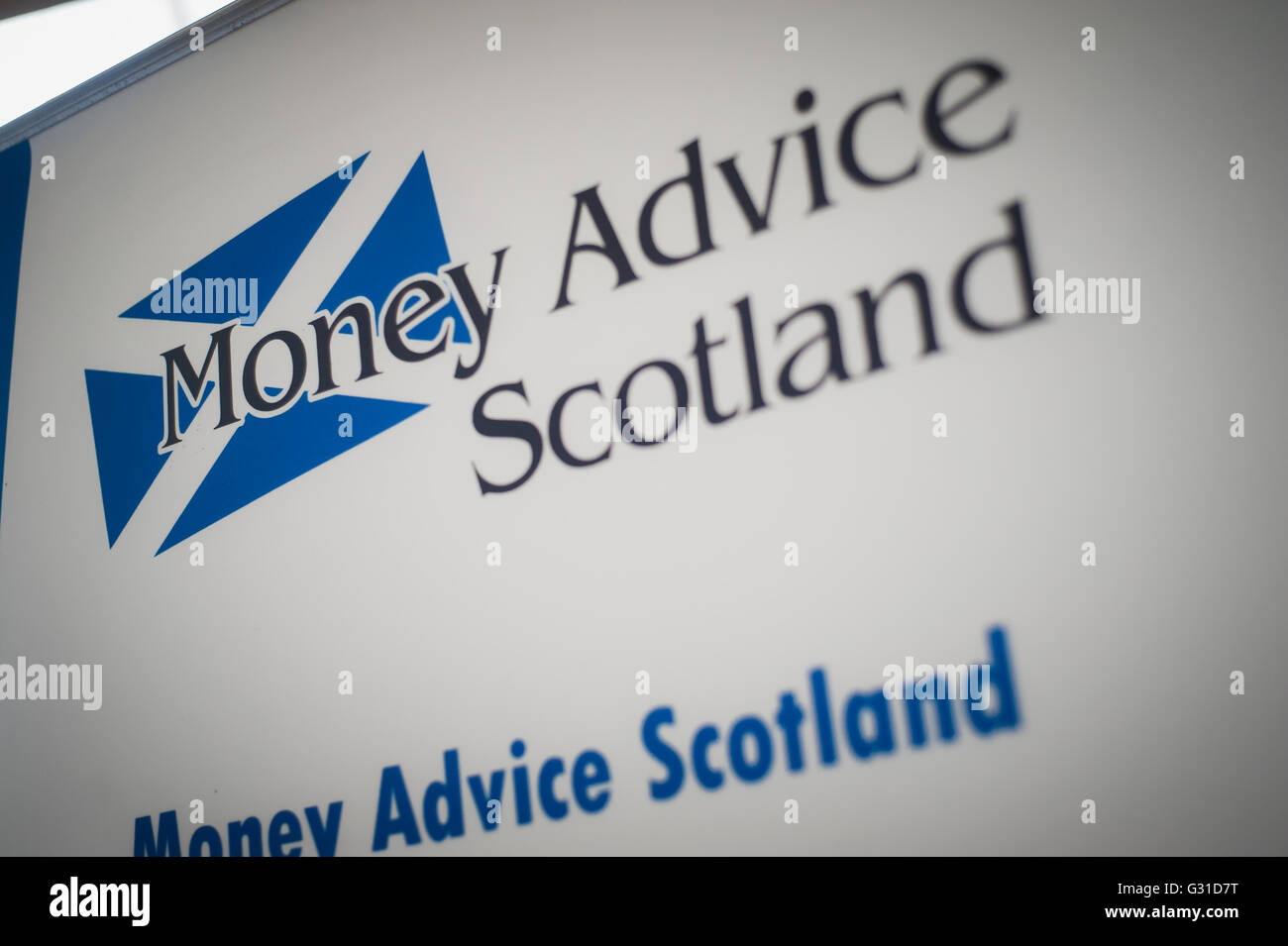 Money Advice Scotland logo su banner Foto Stock