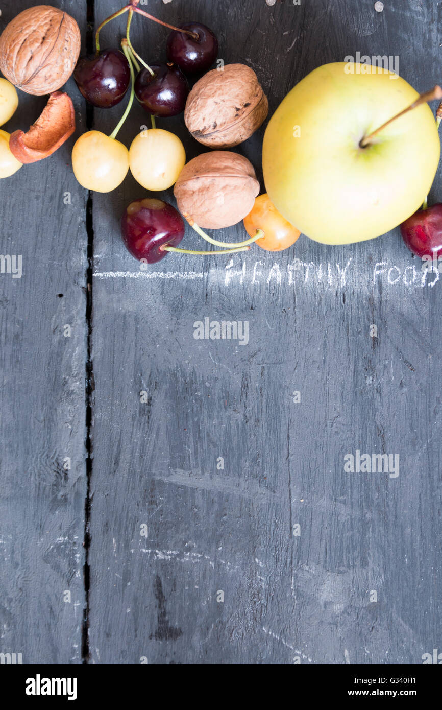 Frutti di sfondo rustico, cibo sfondo. Foto Stock