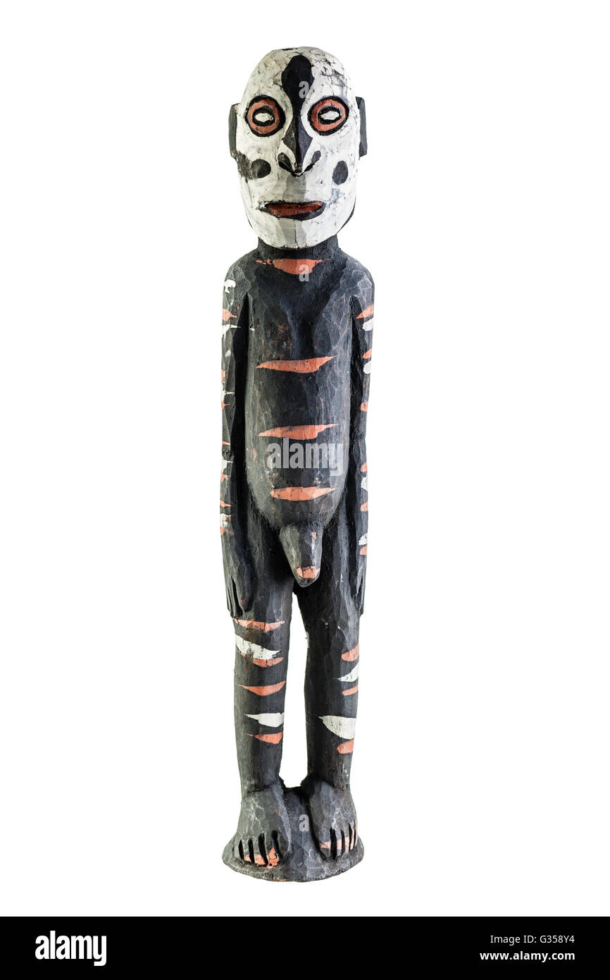 Un antico statuetta aborigena isolate su uno sfondo bianco Foto Stock