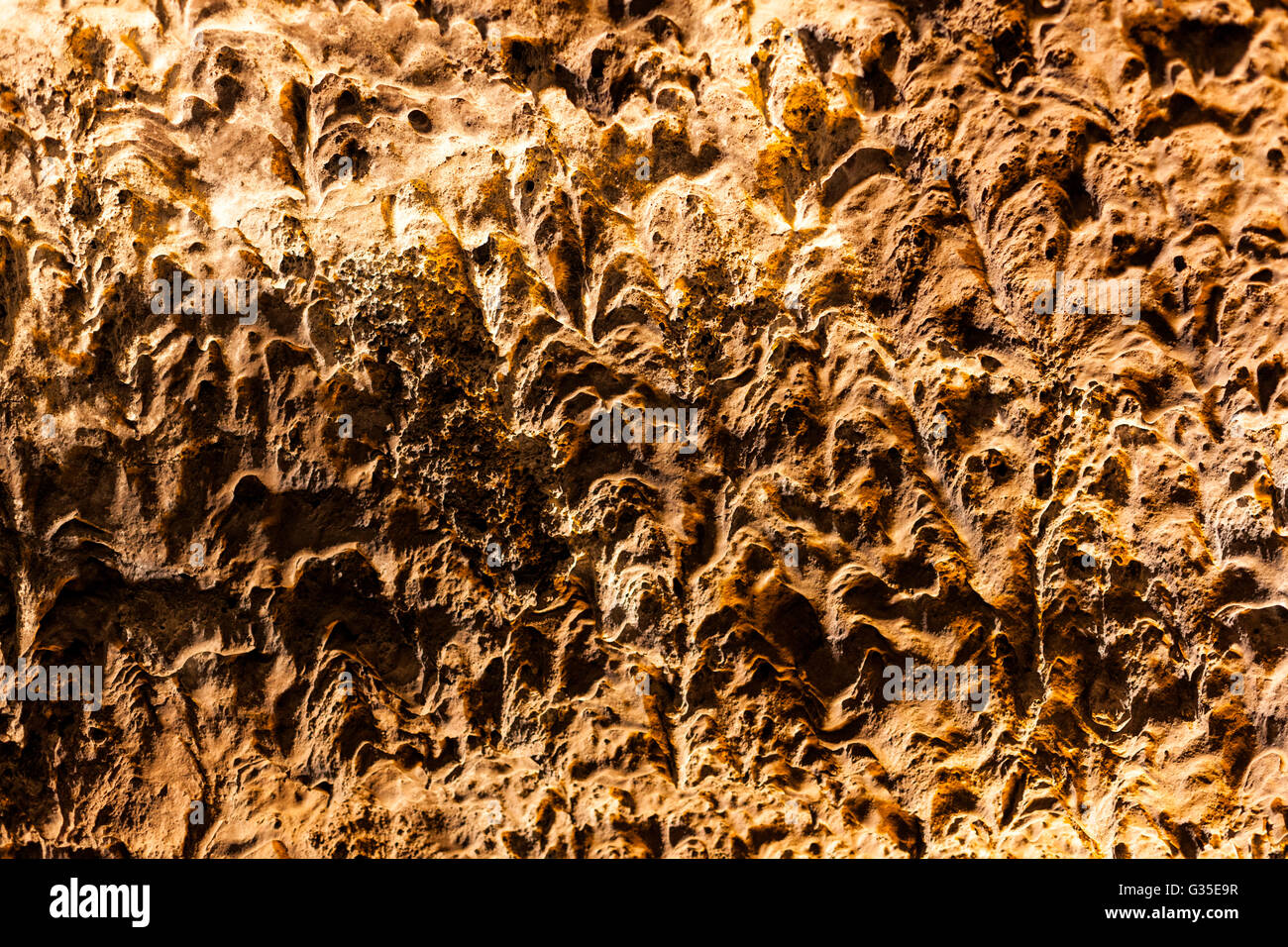 Modello di grunge di lava solidificata nella parete di una grotta Foto Stock