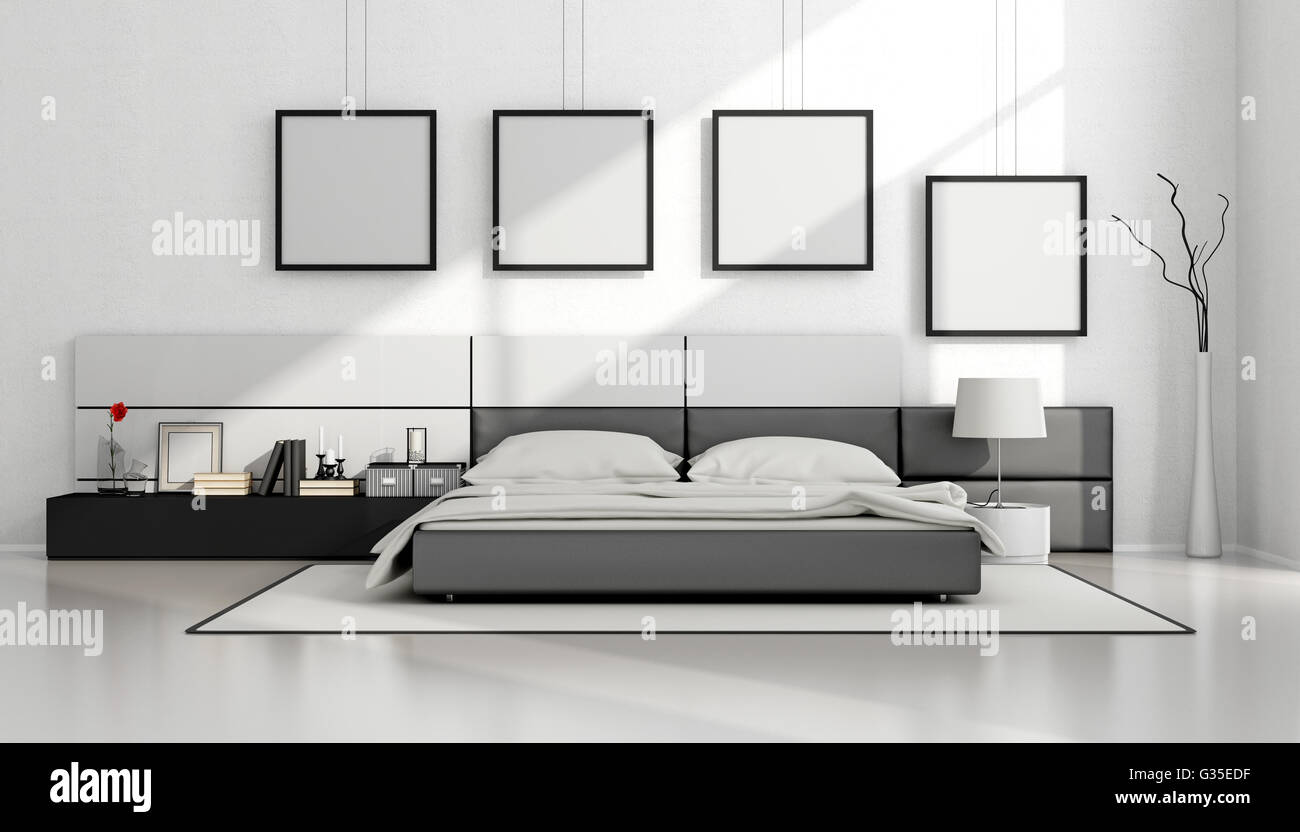 Bianco e nero minimalista di camera da letto con letto matrimoniale e la cornice vuota sul muro - il rendering 3D Foto Stock