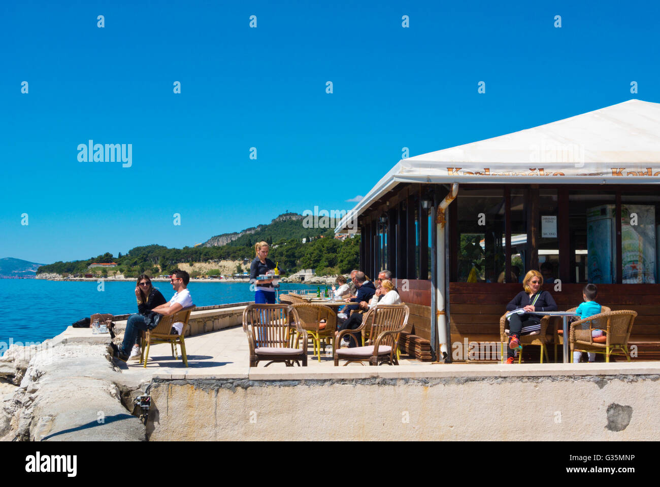 Cafe terrazza, Zvoncac bay, Split, Dalmazia, Croazia Foto Stock