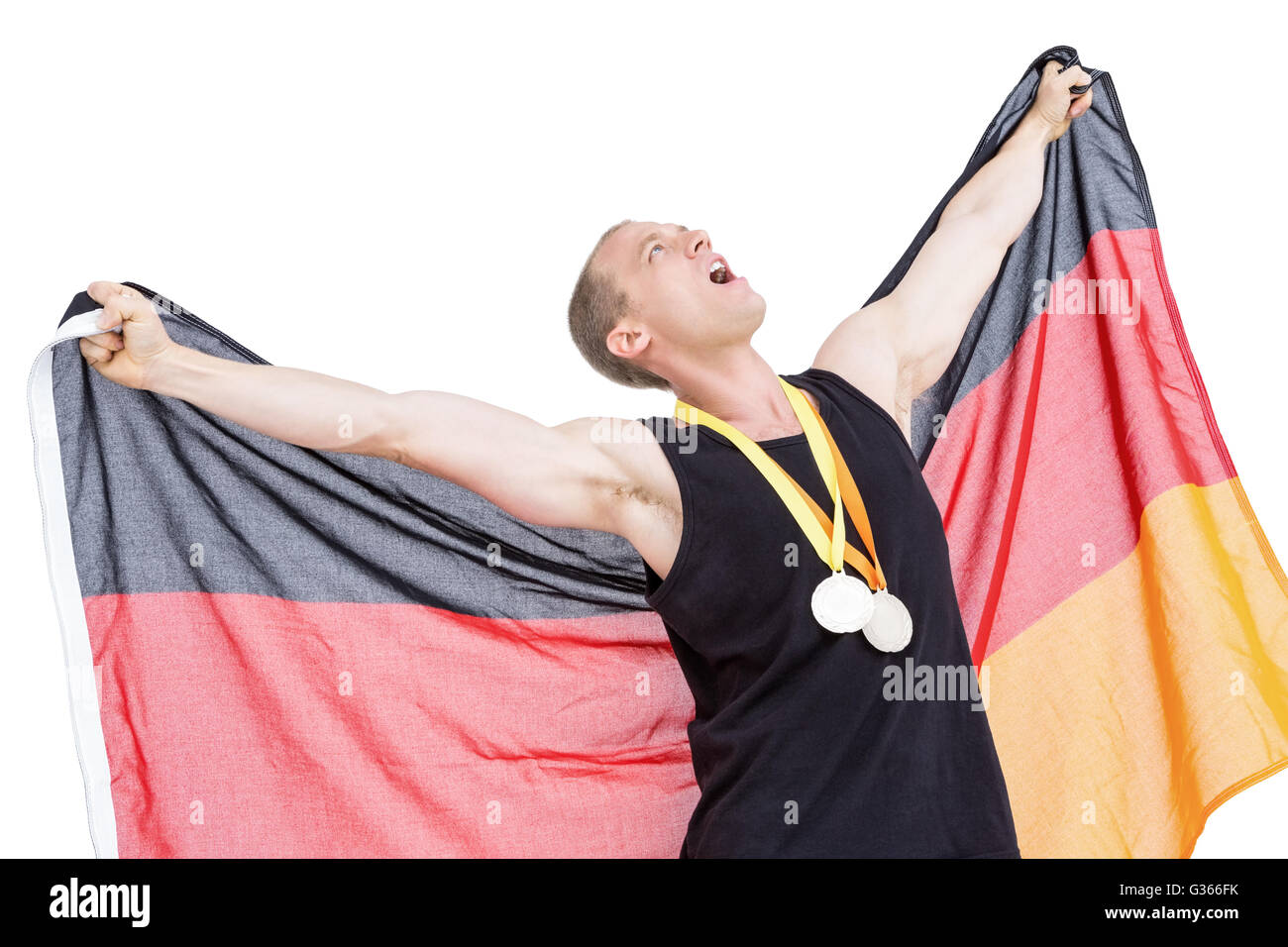 Atleta in posa con la medaglia d'oro alle olimpiadi intorno al suo collo Foto Stock