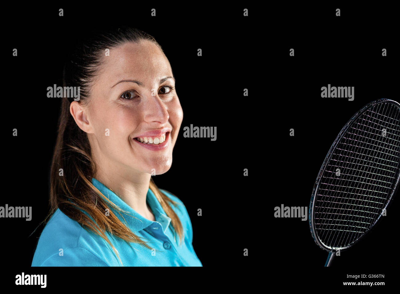 Atleta femminile azienda badminton racchetta Foto Stock