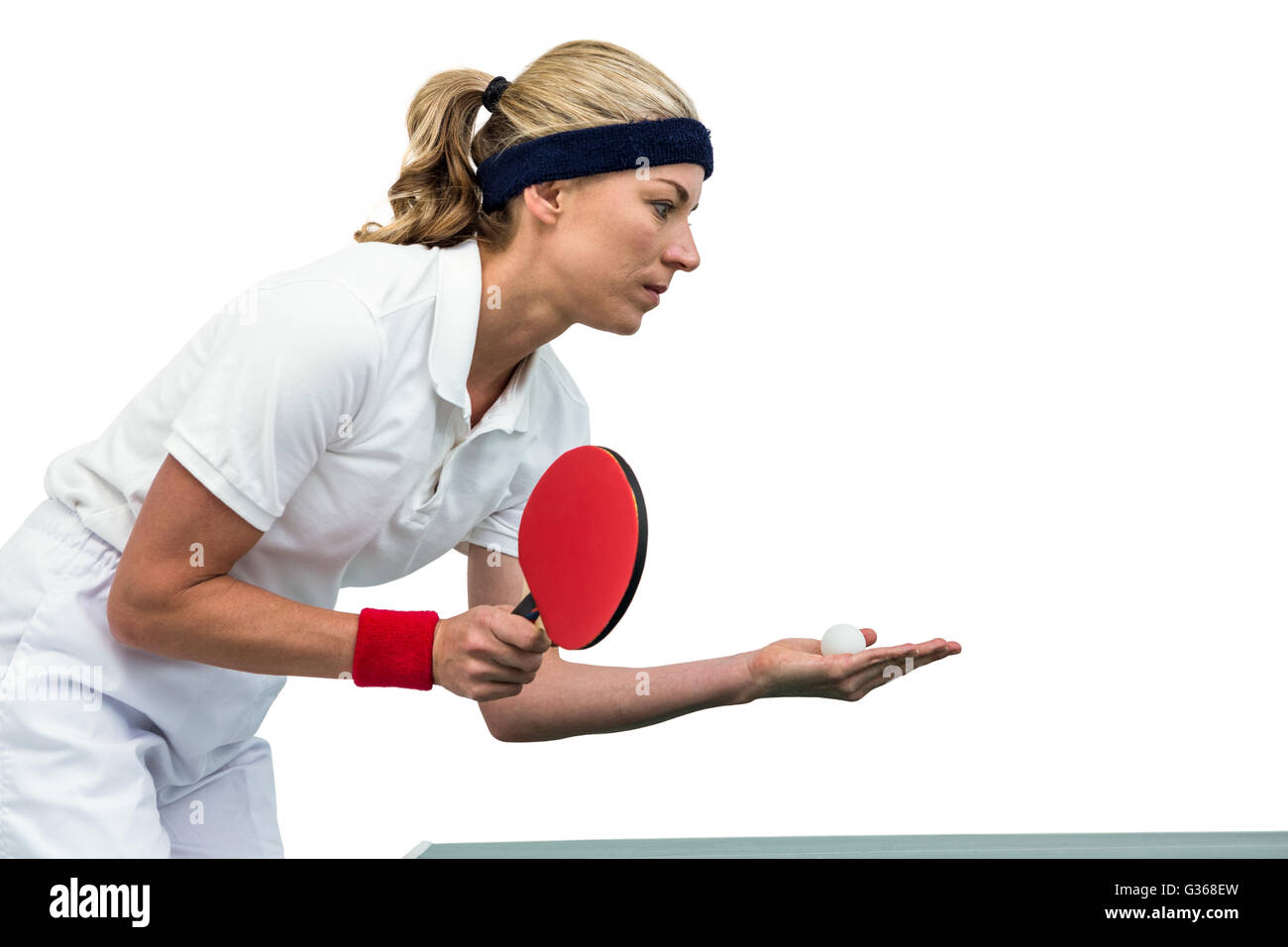 Atleta femminile giocando a ping-pong Foto Stock