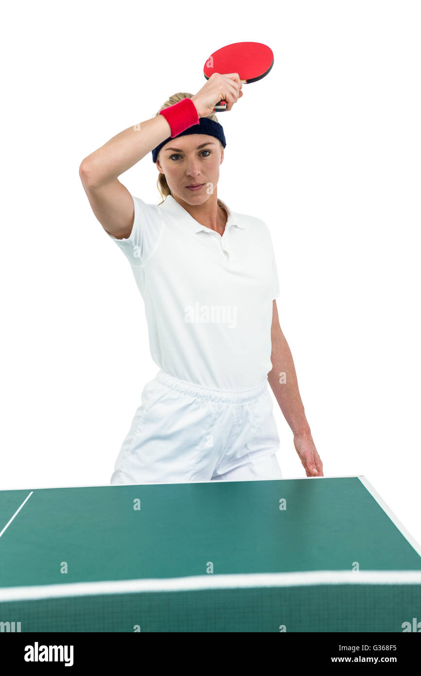 Atleta femminile giocando a ping-pong Foto Stock