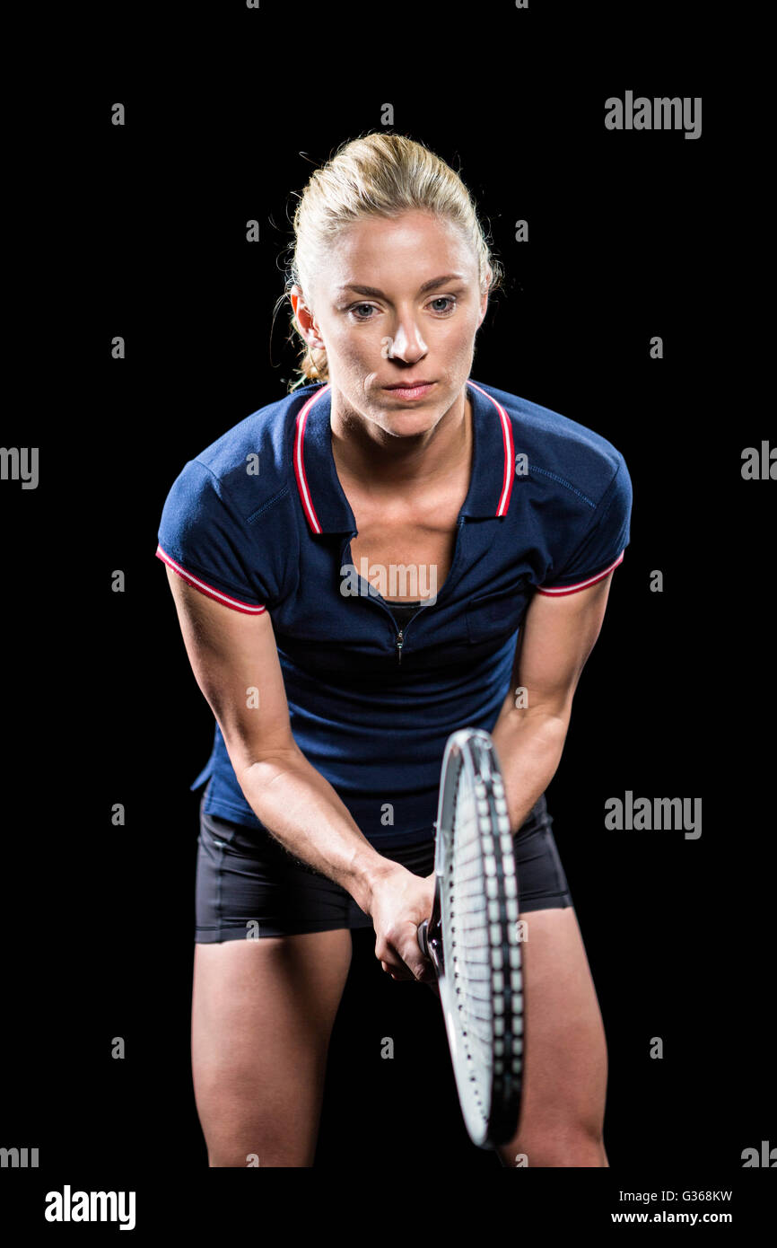 Giocatore di tennis giocando a tennis con una racchetta Foto Stock