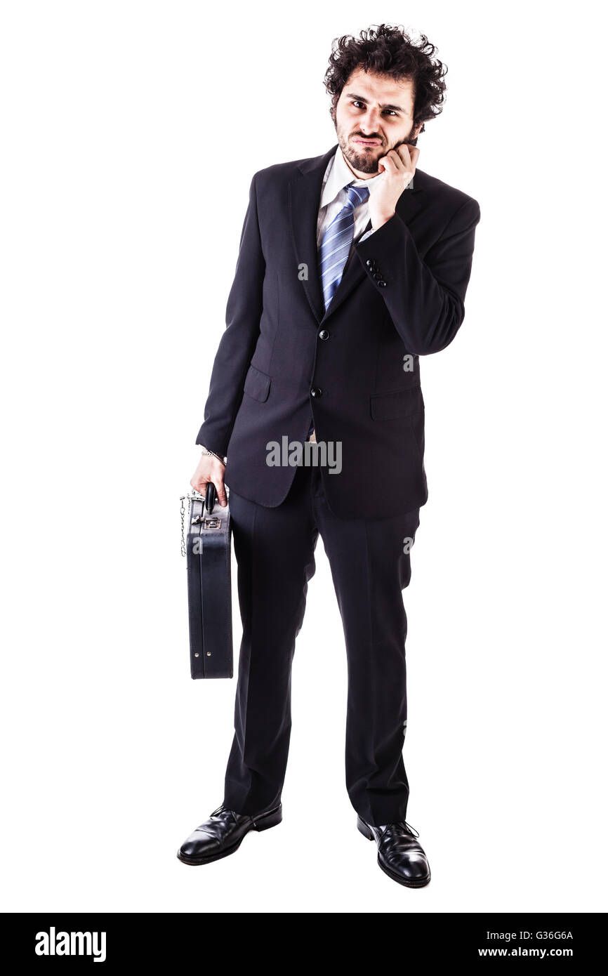 Imprenditore che indossa un abito con una valigia sicura attaccato con manette isolate su uno sfondo bianco Foto Stock