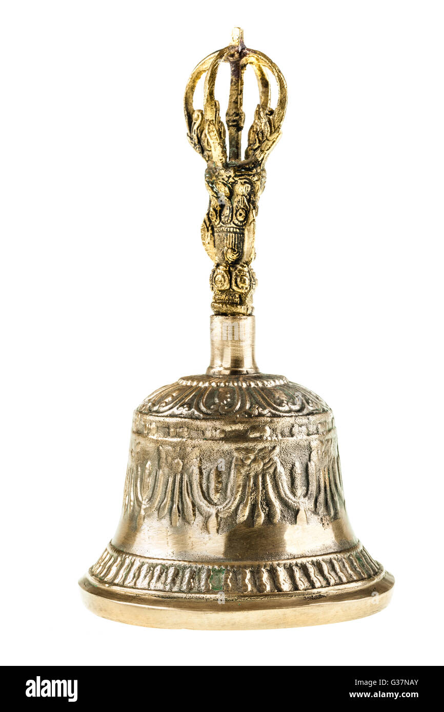 Un bronzo buddista campana a mano isolate su uno sfondo bianco Foto Stock