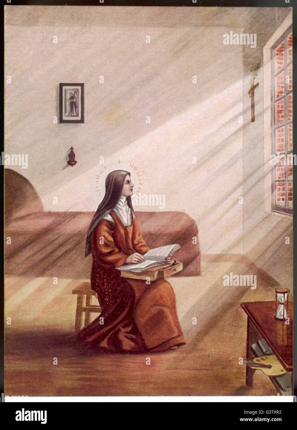 Teresa Martin(1873-1897), più tardi conosciuto come Sainte Therese de l'Enfant Jesus(St Teresa di Lisieux). Come una monaca carmelitana, scrive "L'Histoire de son Ame' (la storia della sua anima) nella cella del suo convento; essa viene pubblicata dopo la sua morte, nel 1898. Foto Stock