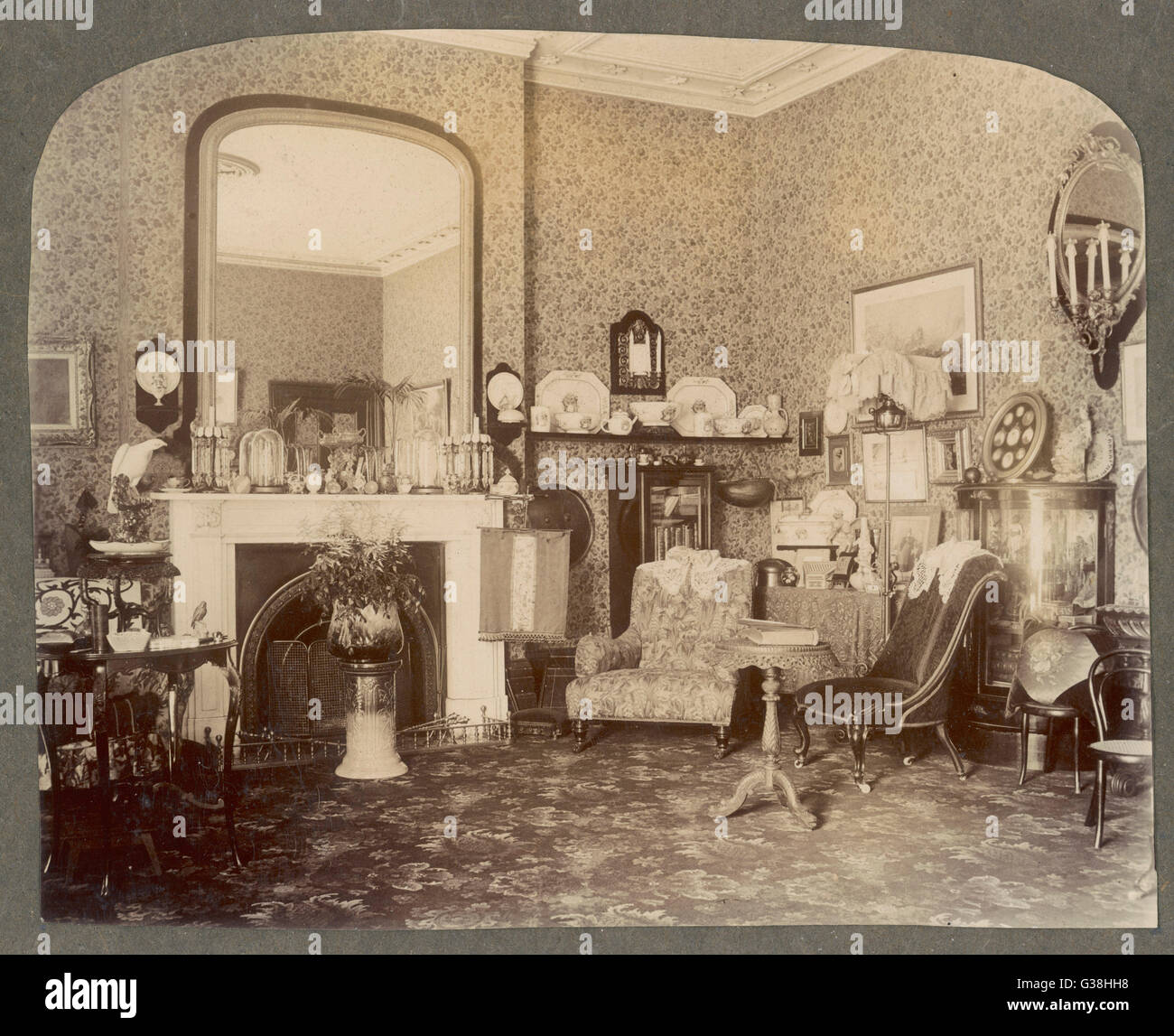 Un salotto vittoriano camera Data: circa 1900 Foto Stock