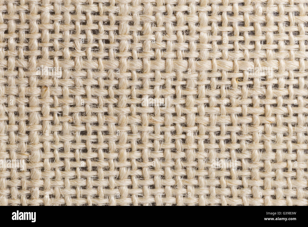 Sfondo di messa a fuoco ravvicinata su marrone tessuto realizzato da ruvida filo di canapa. Esso progettato da diverse dimensioni della stringa attraversate in tab Foto Stock