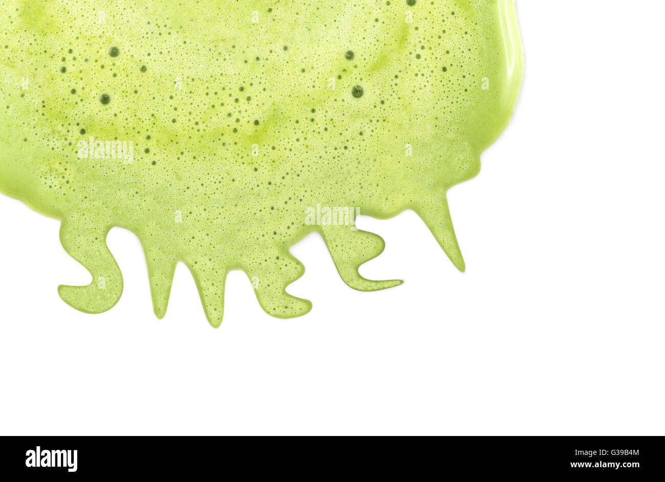 Sfondo di messa a fuoco ravvicinata sulla fusione di tè verde gelato con piccola bolla d'aria sulla superficie. Si fondono e flusso di essere " dolce " parola. Foto Stock