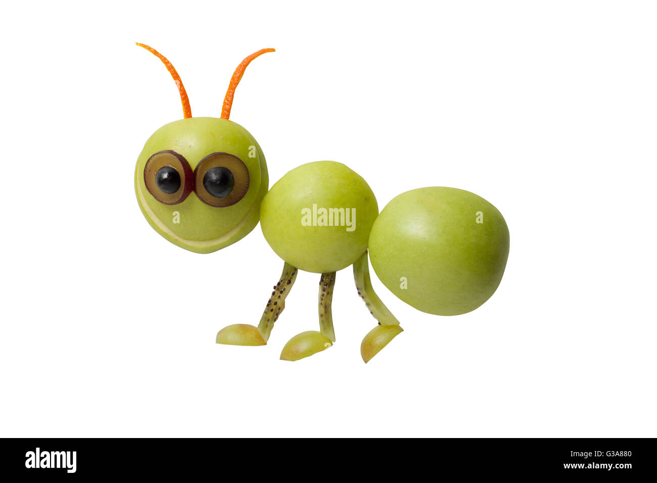 Funny ant fatta di mela verde e kiwi Foto Stock