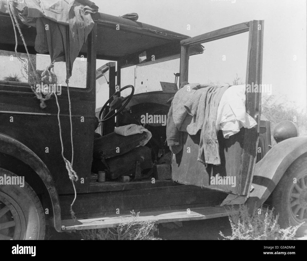 La sola casa di una depressione-instradata famiglia di nove da Iowa. Data 1936 Feb. Foto Stock