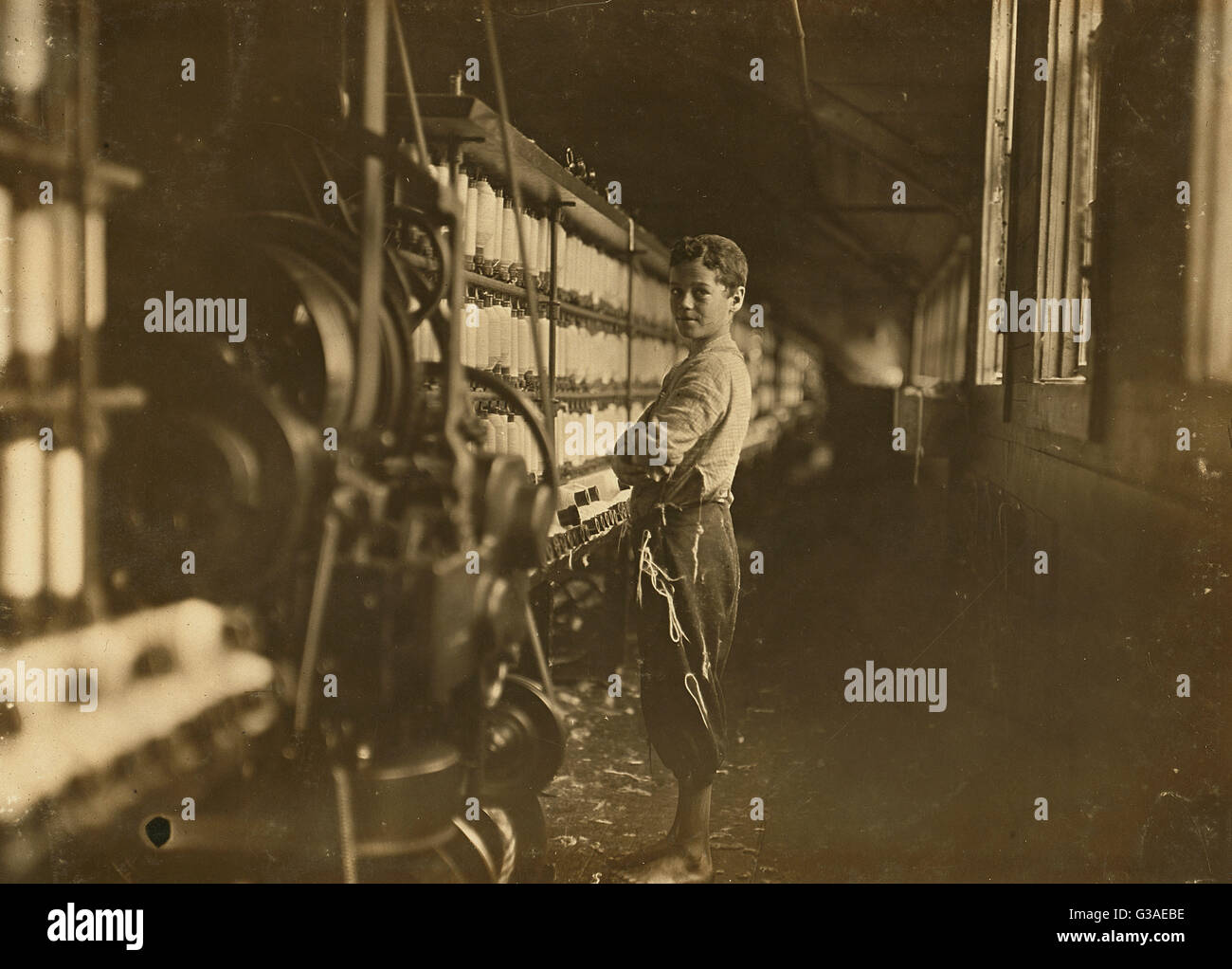 John Dempsey lavora in filatoio 1909 Foto Stock
