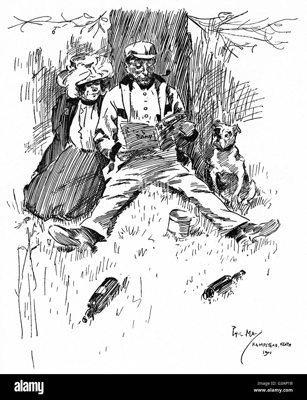 Cockney Couple su Hampstead Heath leggendo una rivista Foto Stock