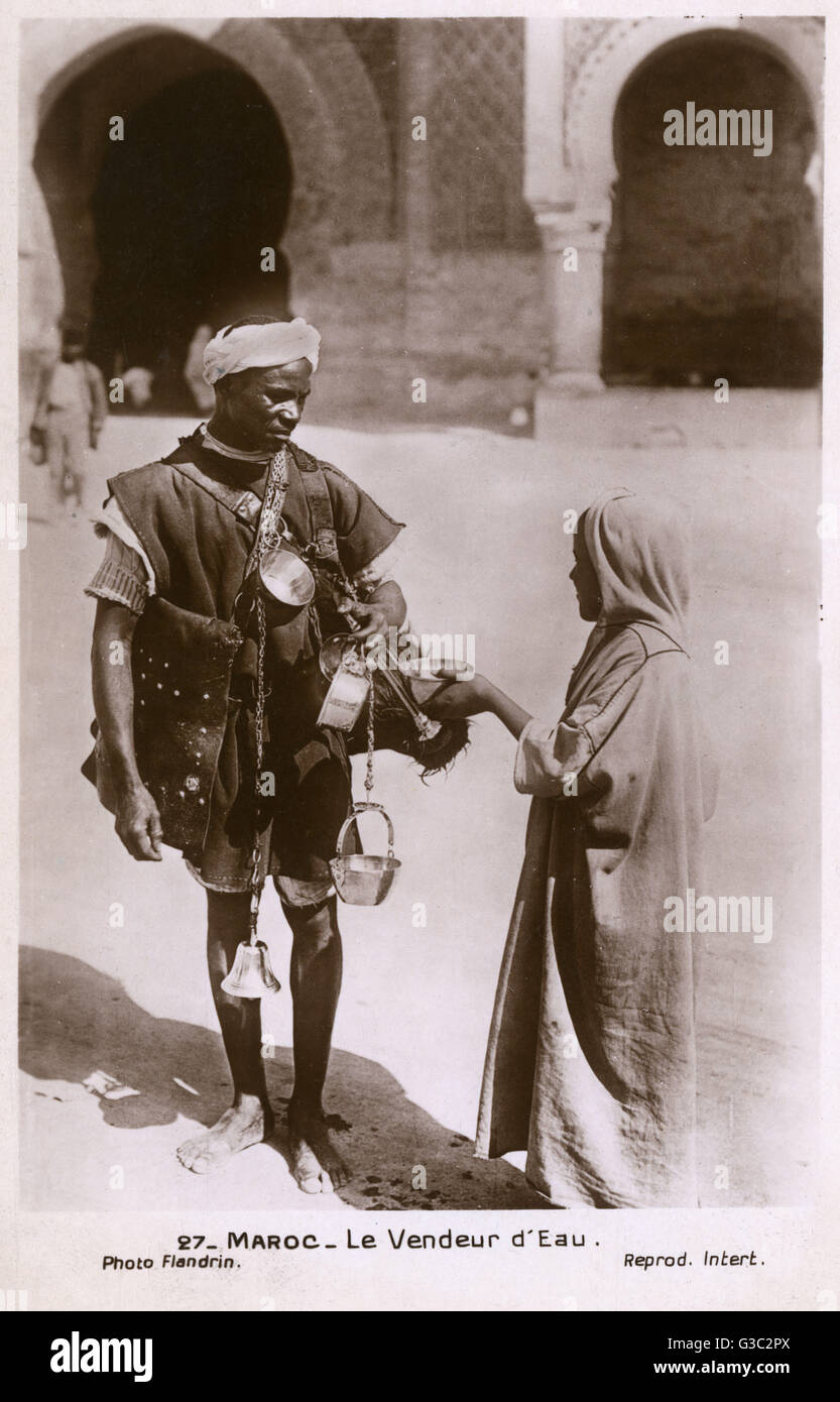 Venditore ambulante di acqua di strada - Marocco Foto Stock