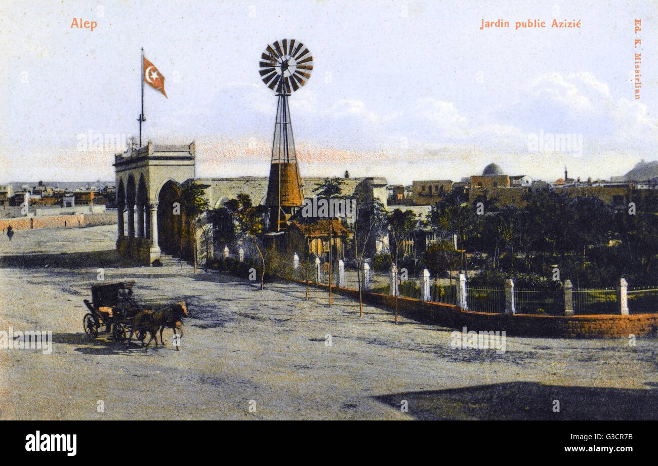 Aleppo, Siria - Giardini pubblici di Azizie con mulino a vento Foto Stock