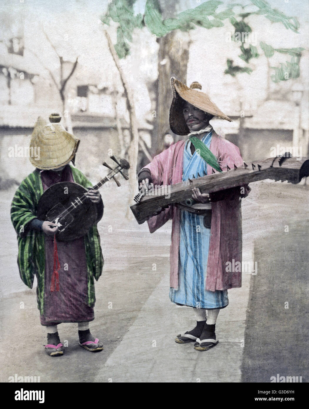 Musicisti di strada, Giappone, circa 1890 Foto Stock