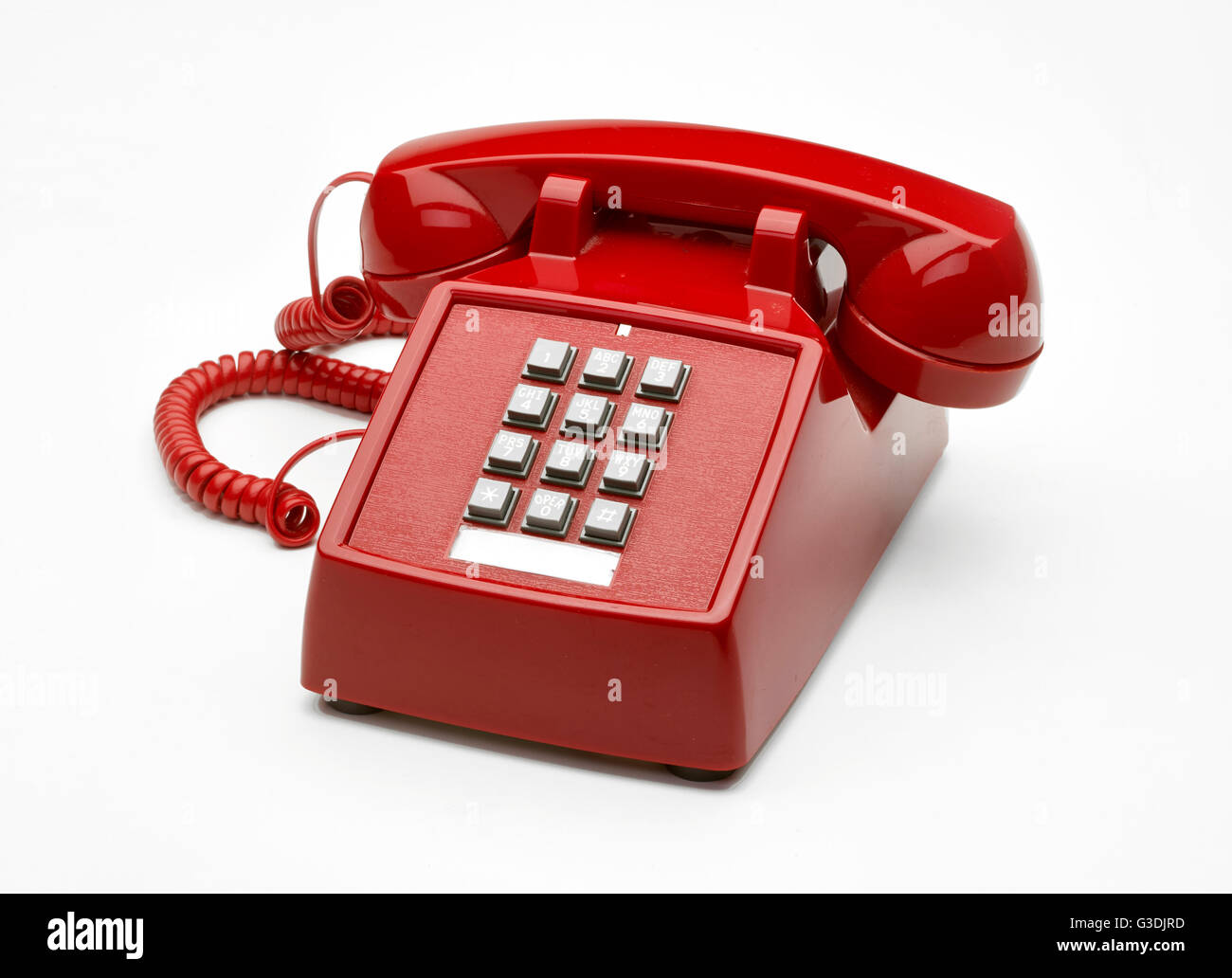 Il vecchio telefono rosso Foto Stock