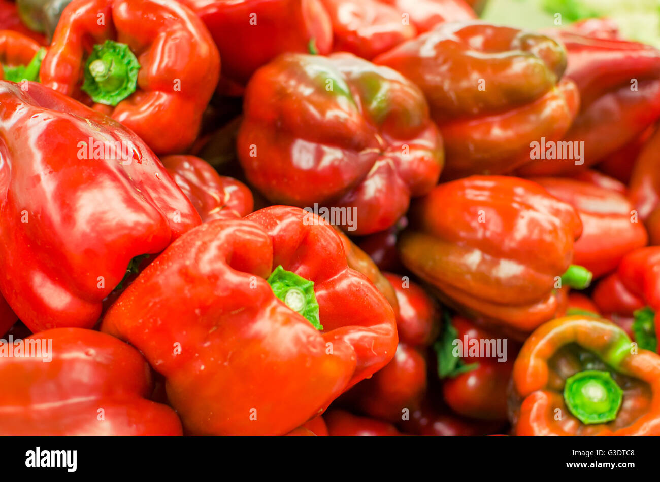 Peperoni rossi texture di sfondo Foto Stock