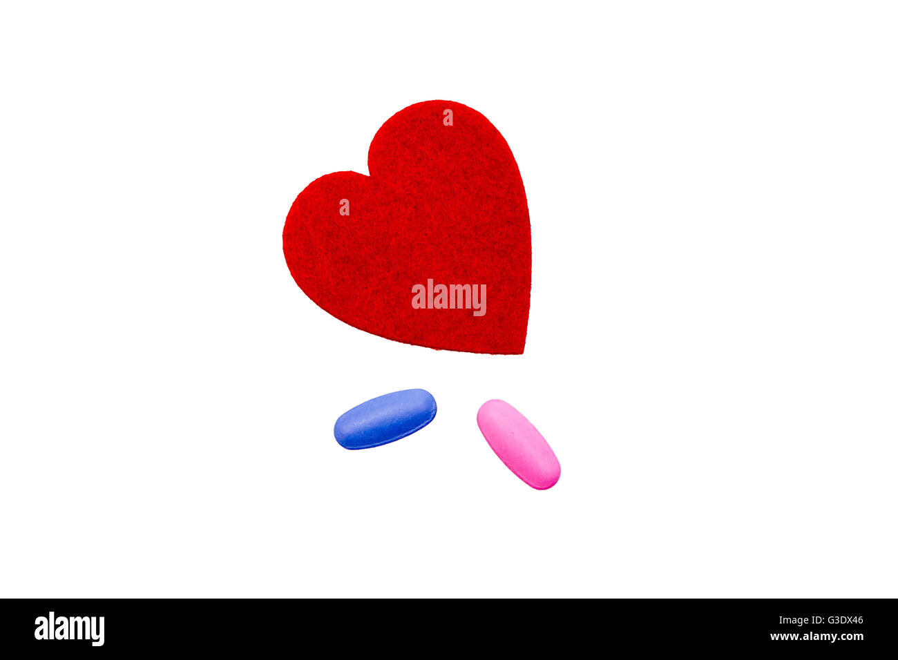 Pillole per amore su uno sfondo bianco visto da sopra Foto Stock
