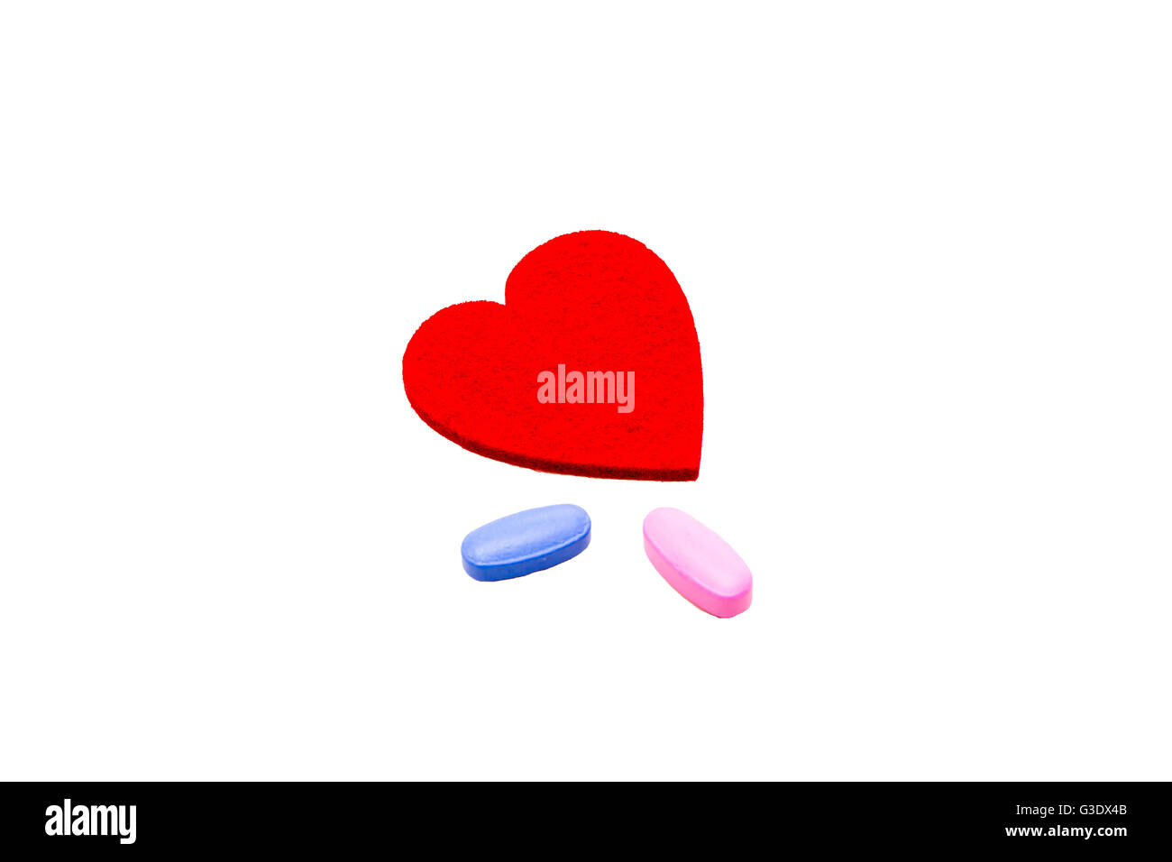 Pillole per amore su sfondo bianco Foto Stock