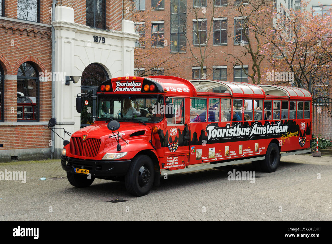 Visite turistiche, viaggio di andata e ritorno, autobus turistico, Amsterdam, Olanda, Paesi Bassi Foto Stock