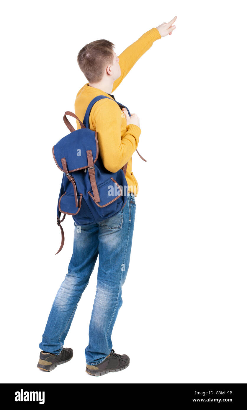 Vista posteriore di puntamento a giovani con lo zaino. Giovane ragazzo gesto. Vista posteriore di raccolta persone. vista posteriore di persona. Isolato su sfondo bianco. Foto Stock