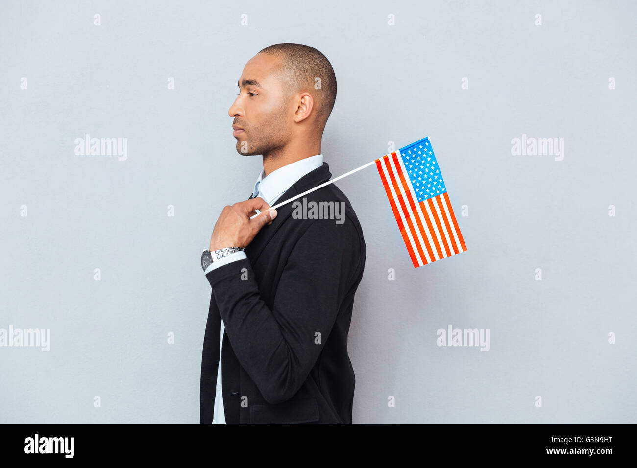 Profilo di African American giovane con noi bandiera Foto Stock