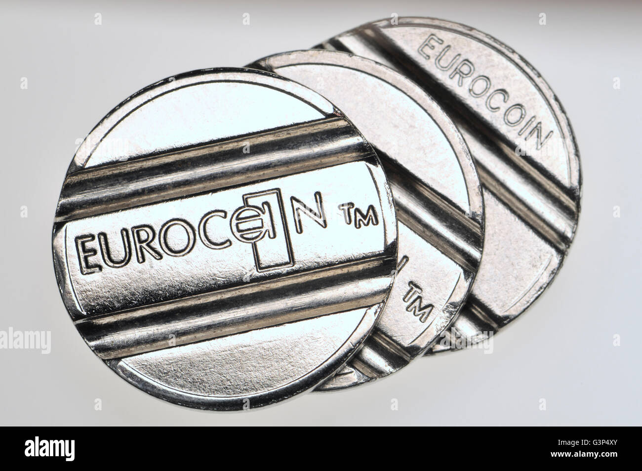 Eurocoin TM di doppia scanalatura token, utilizzati in una vasta gamma di distributori automatici Foto Stock