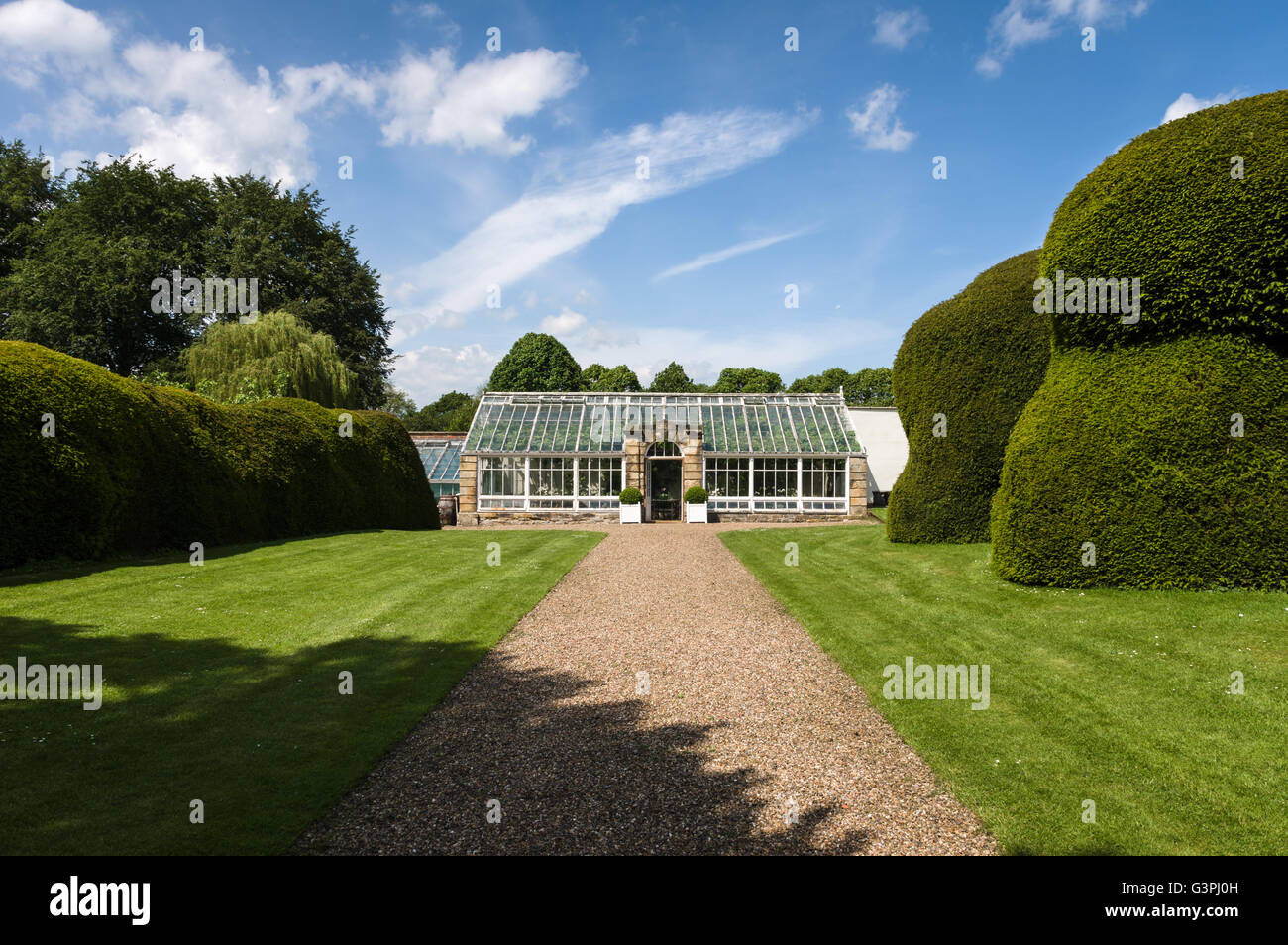Un tradizionale giardino all inglese con hot house Foto Stock