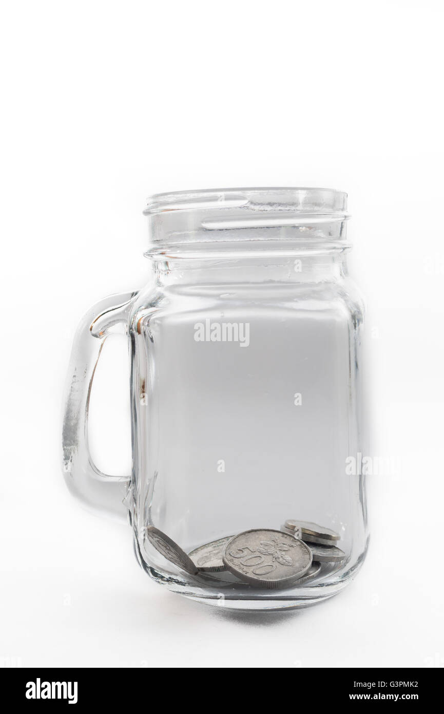 Rupiah moneta all'interno del vaso Foto Stock