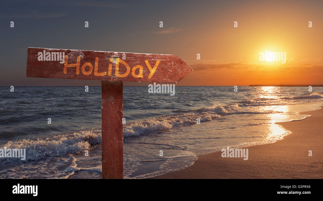 Cartello di vacanza sulla spiaggia Foto Stock