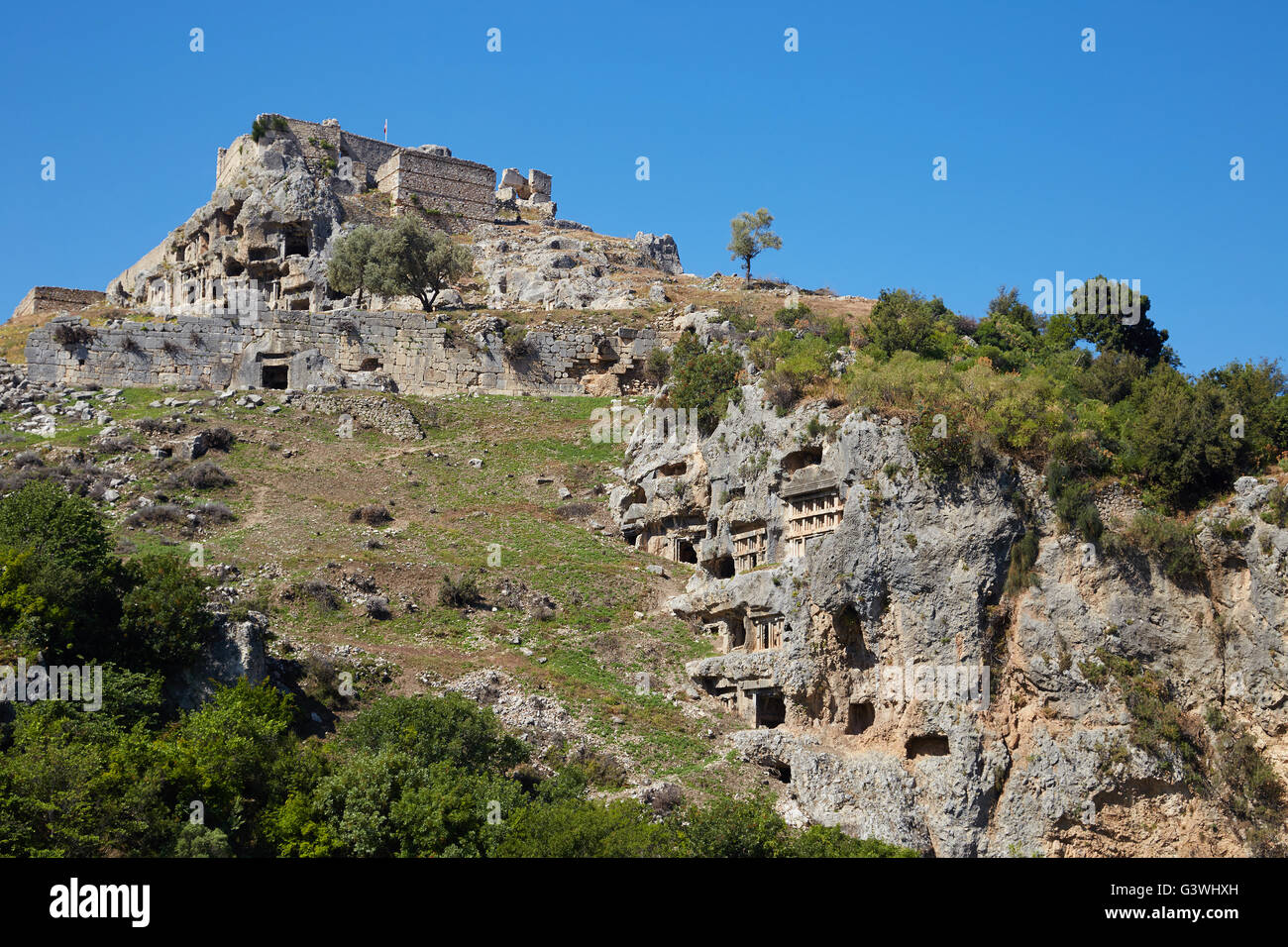 Lycian rock sepolture presso la città antica Tlos, Lycia, Turchia. Foto Stock