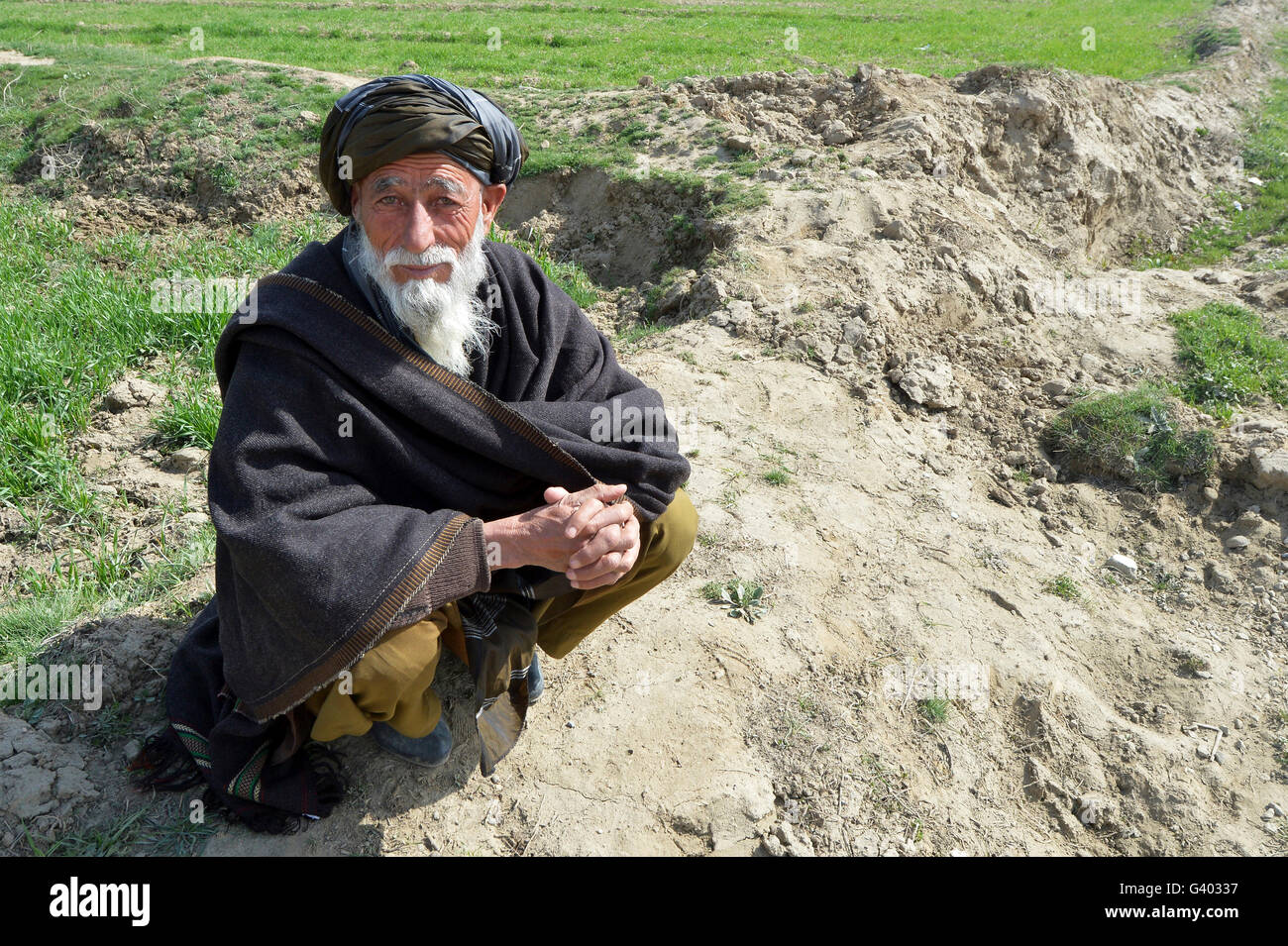 Un locale uomo afghano nei pressi di un villaggio in Afghanistan. Foto Stock