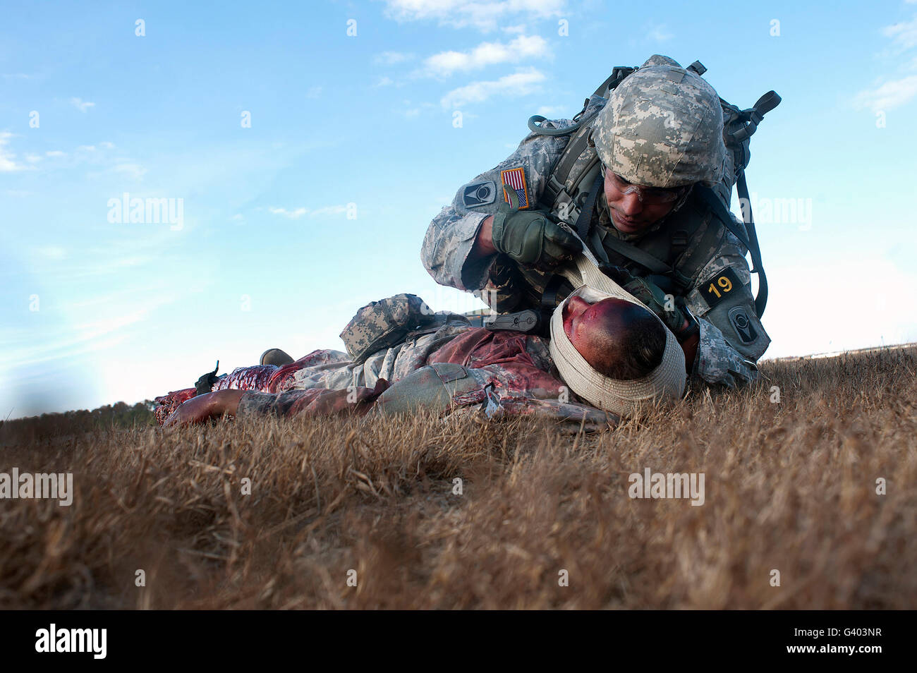 Stati Uniti Esercito bende fante un soldato ferito. Foto Stock