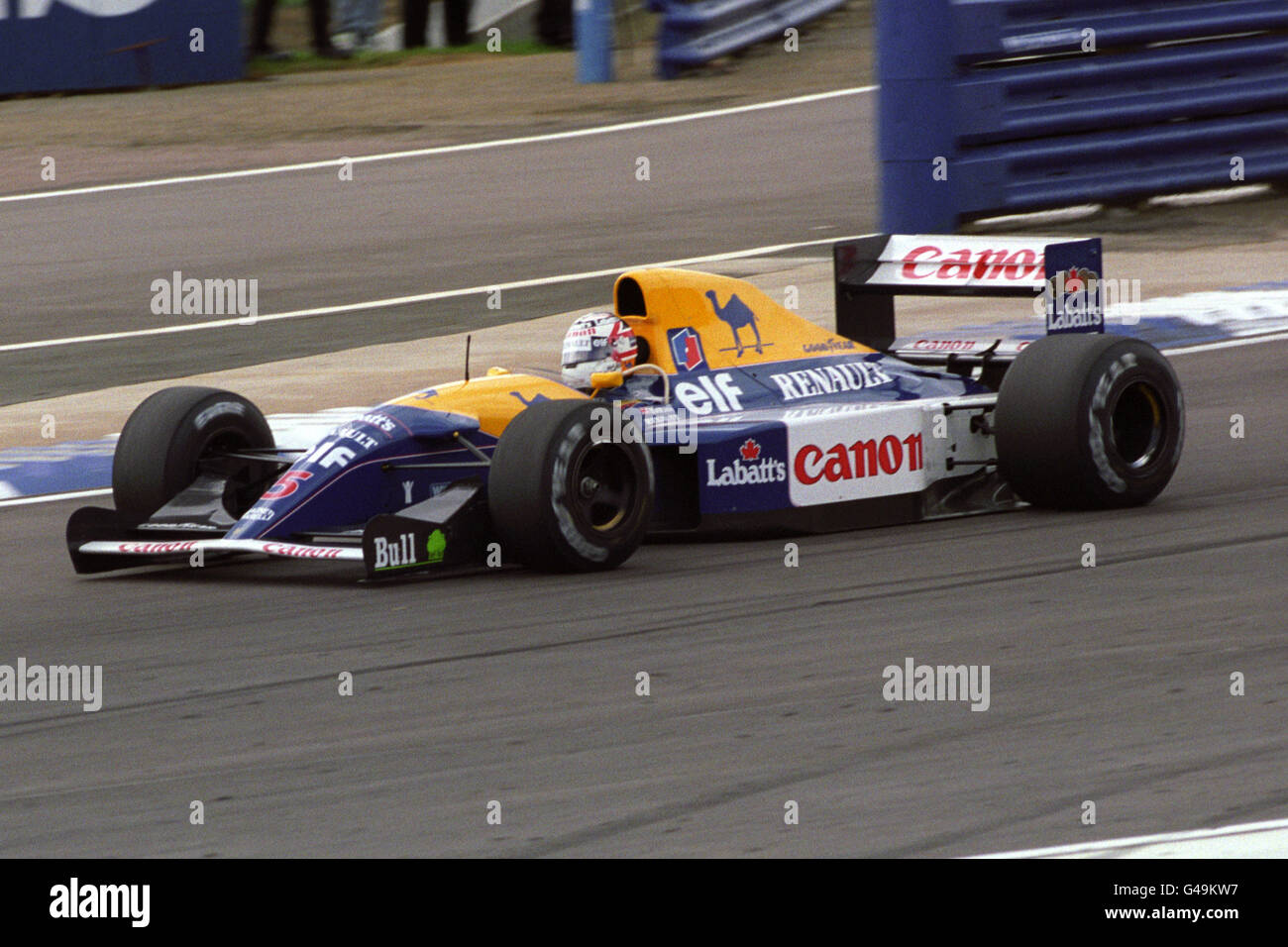 Nigel Mansell nella Williams-Renault sulla sua strada per vincere il Gran Premio di Gran Bretagna. Il Gran Bretagna Nigel Mansell ha segnato un Grand Chelem in gara (ha guidato ogni giro dalla pole position e ha stabilito il giro più veloce della gara) come parte della sua stagione vincente del Campionato di Formula uno 1992. Foto Stock