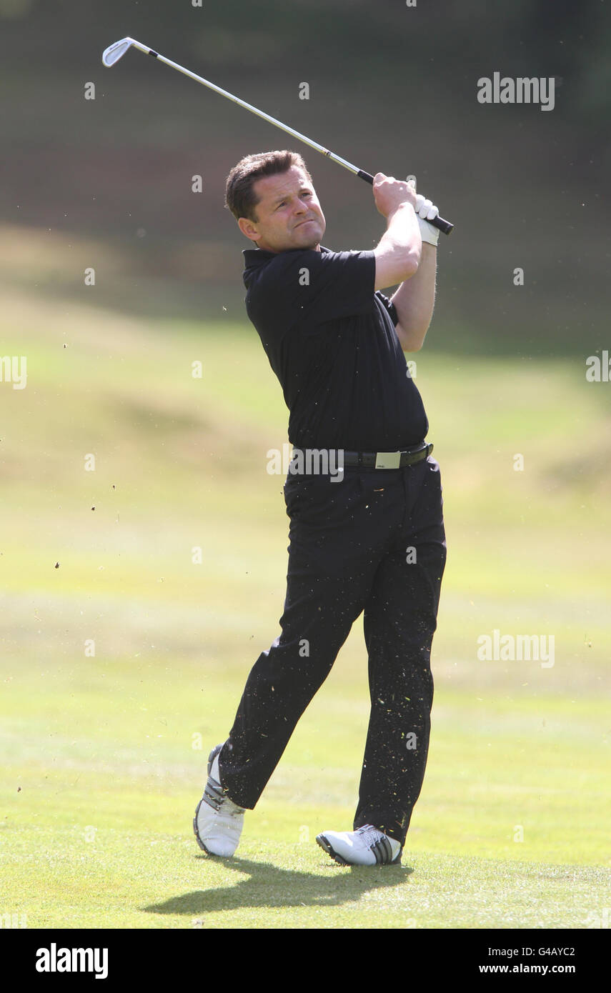 Chris Hollins, presentatore sportivo della BBC Breakfast durante il BMW PGA Pro-Am al Wentworth Golf Club, Surrey. Foto Stock