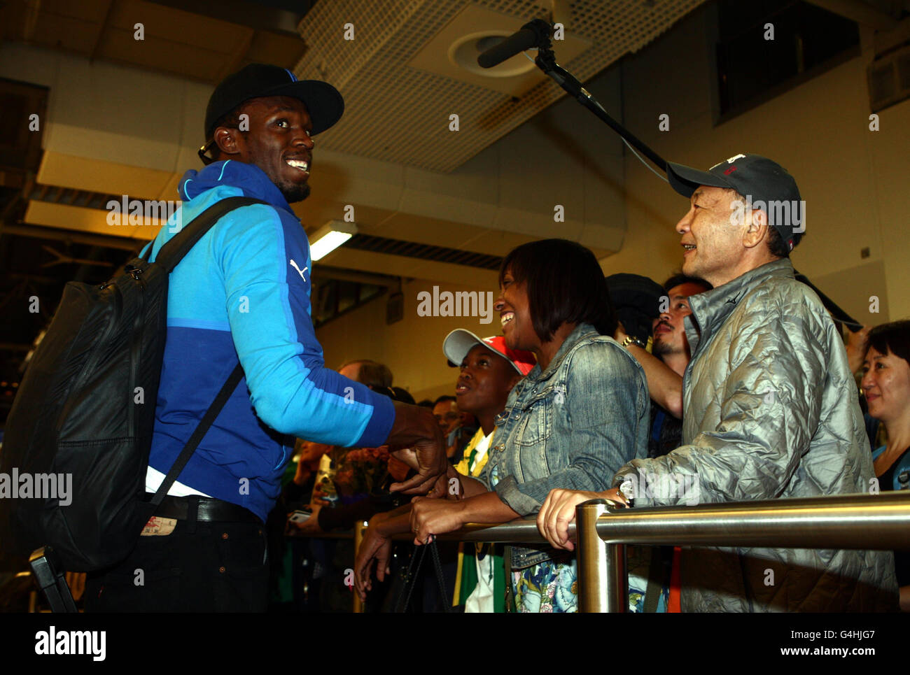 Atletica - Dai verdi e Mo Farah Home prossimi - Aeroporto di Heathrow Foto Stock